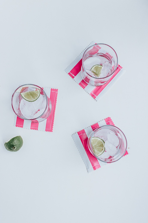 Tutorial for making these DIY oilcloth, water resistant drink coasters for Summer!