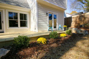 back deck and back of house view after landscaping