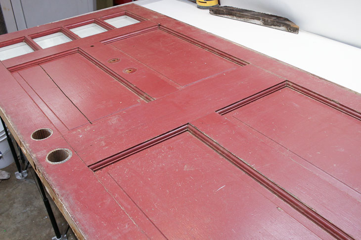 burgundy side of dumpster found door