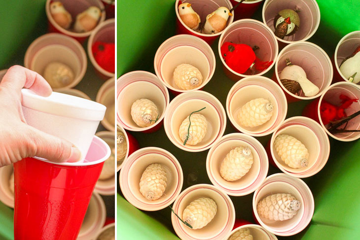 put ornaments in foam and plastic cups