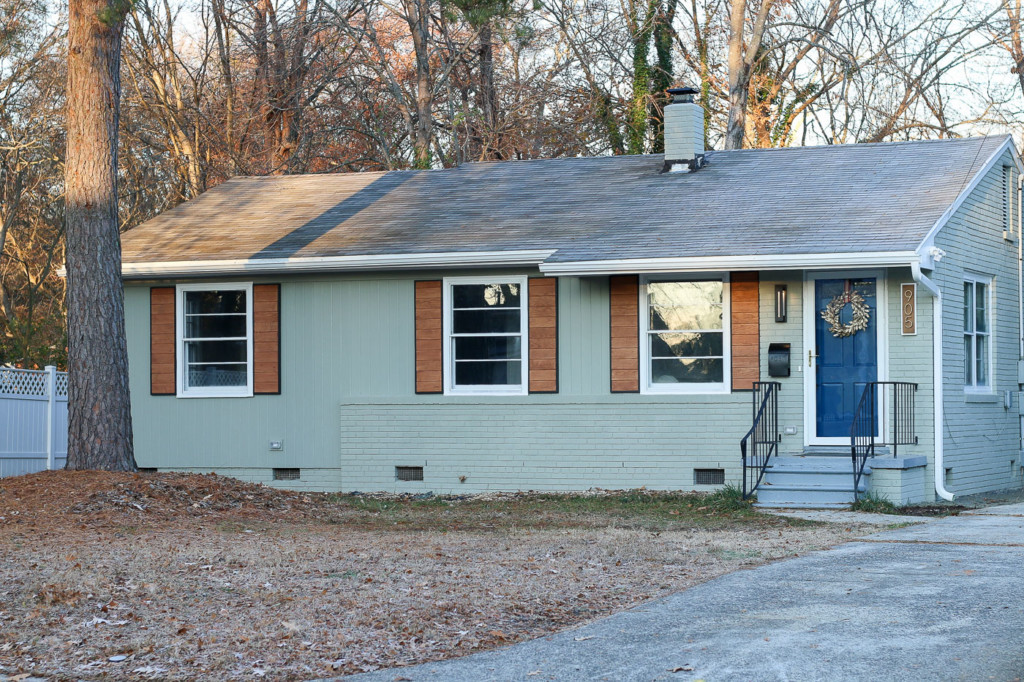 1905's ranch with modern wood shutters