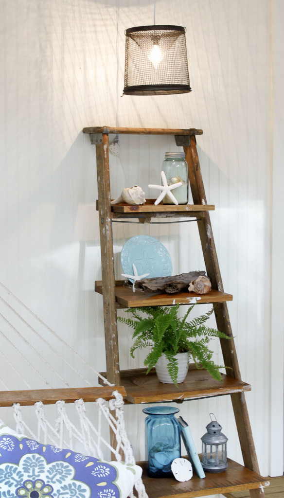 ladder display shelf resting against wall