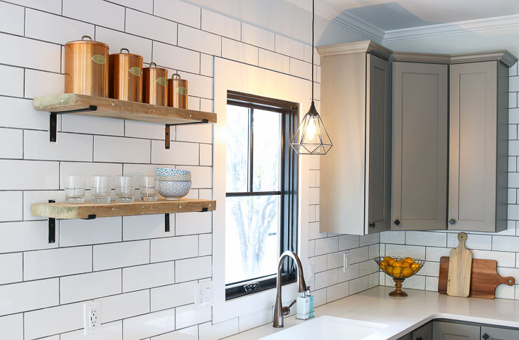 Open modern farmhouse shelves on subway backsplash