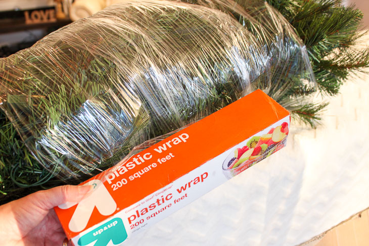 saran wrap your christmas tree for storing