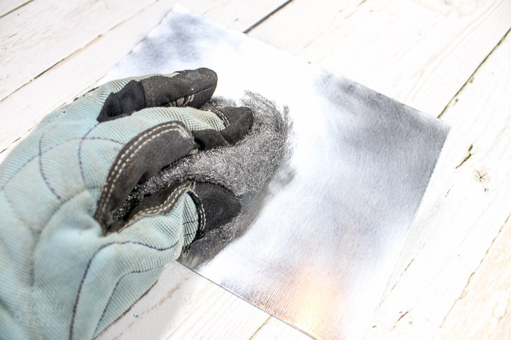 4. Use steel wool to dull sheet metal surface.