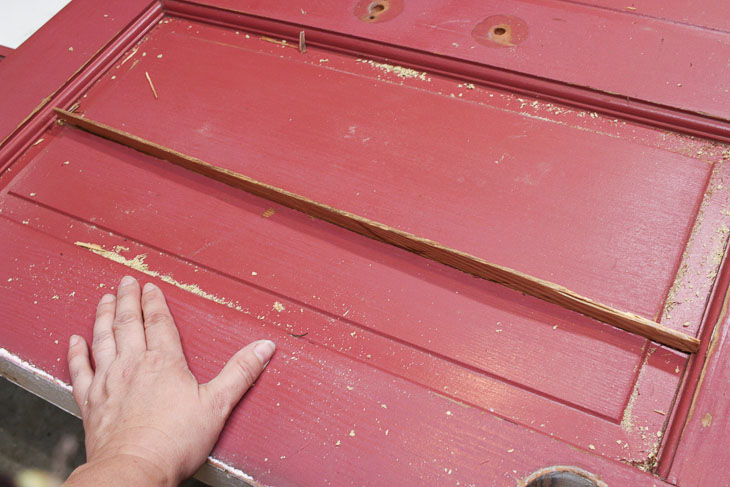 Test fit wood spline in door crack